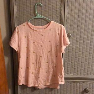 A graphic tee with bananas on them